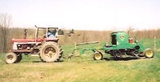 My Husband on his tractor